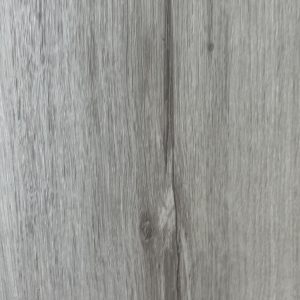 Image of a a close-up of a Polaris Direct Stick Vinyl Plank wood floor