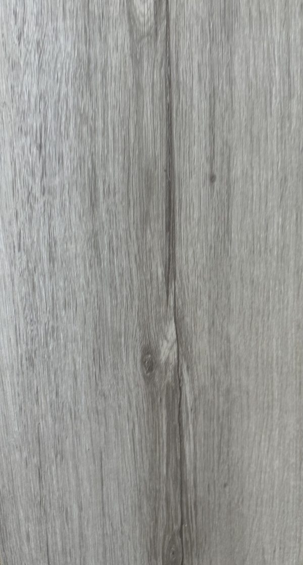 Image of a a close-up of a Polaris Direct Stick Vinyl Plank wood floor